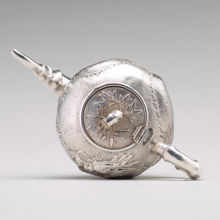 A Chinese four piece silver tea set, Luen Wo, Shanghai, 1875-1925.