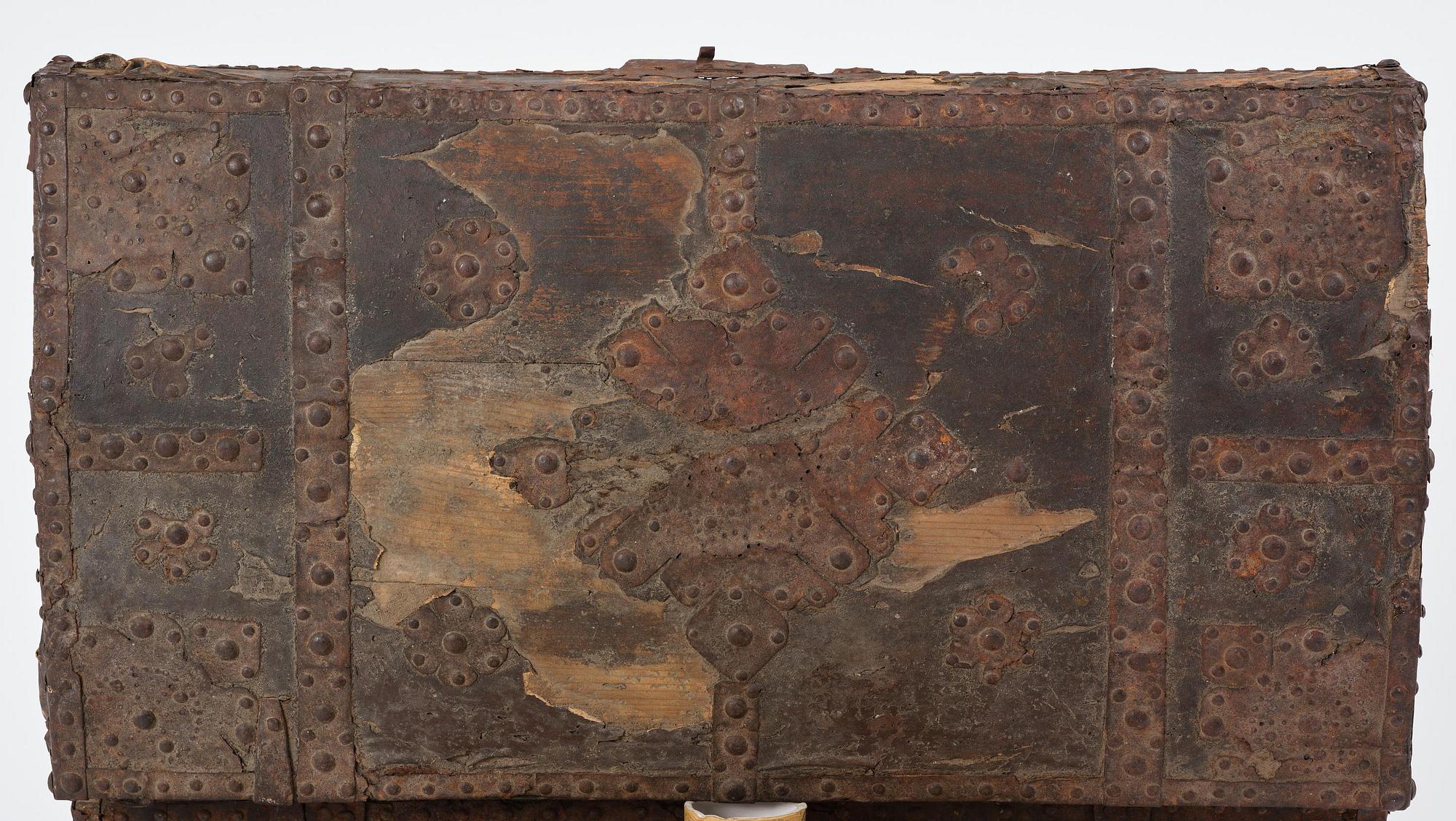 A Dutch baroque iron-bound and leather clad chest, later part 17th century.