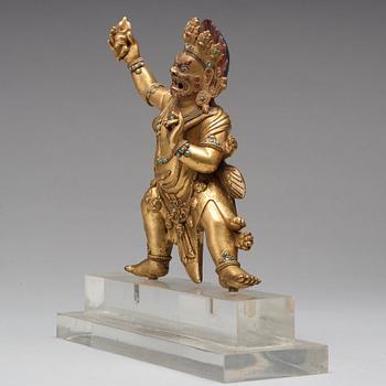 A Sinotibetan gilt bronze figure of Vajrapani, possibly 17/18th Century.