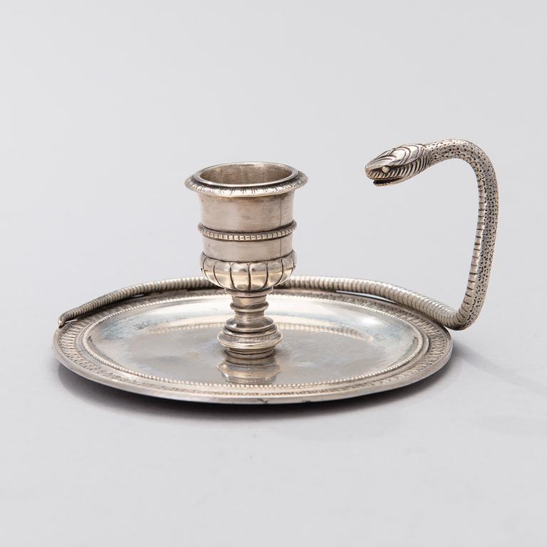 An early 19th century silver chamber candlestick. total weight 170 g.