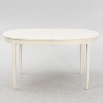 Carl Malmsten, a 'Herrgården' dining table with two extra leaves.