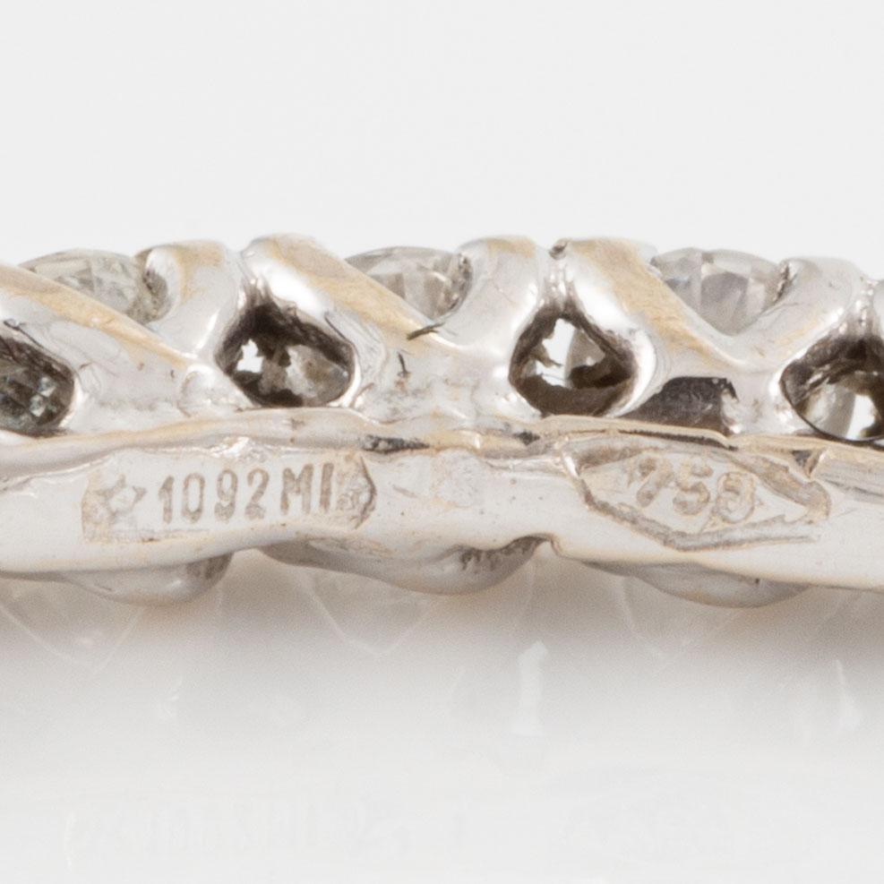 Rings, three pieces, set with brilliant-cut diamonds.
