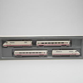 Märklin, electical engines and traincars, H0 in boxes.
