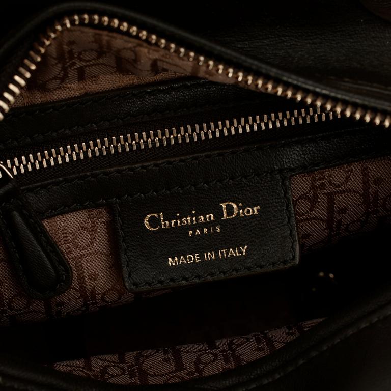 CHRISTIAN DIOR, a green leather "Lady Dior" bag.