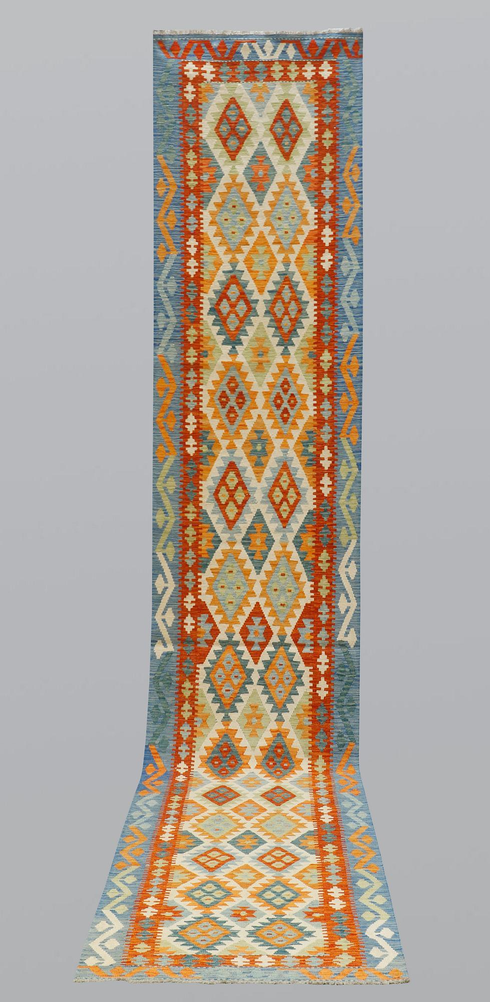 A runner, kilim, ca 487 x 83 cm.