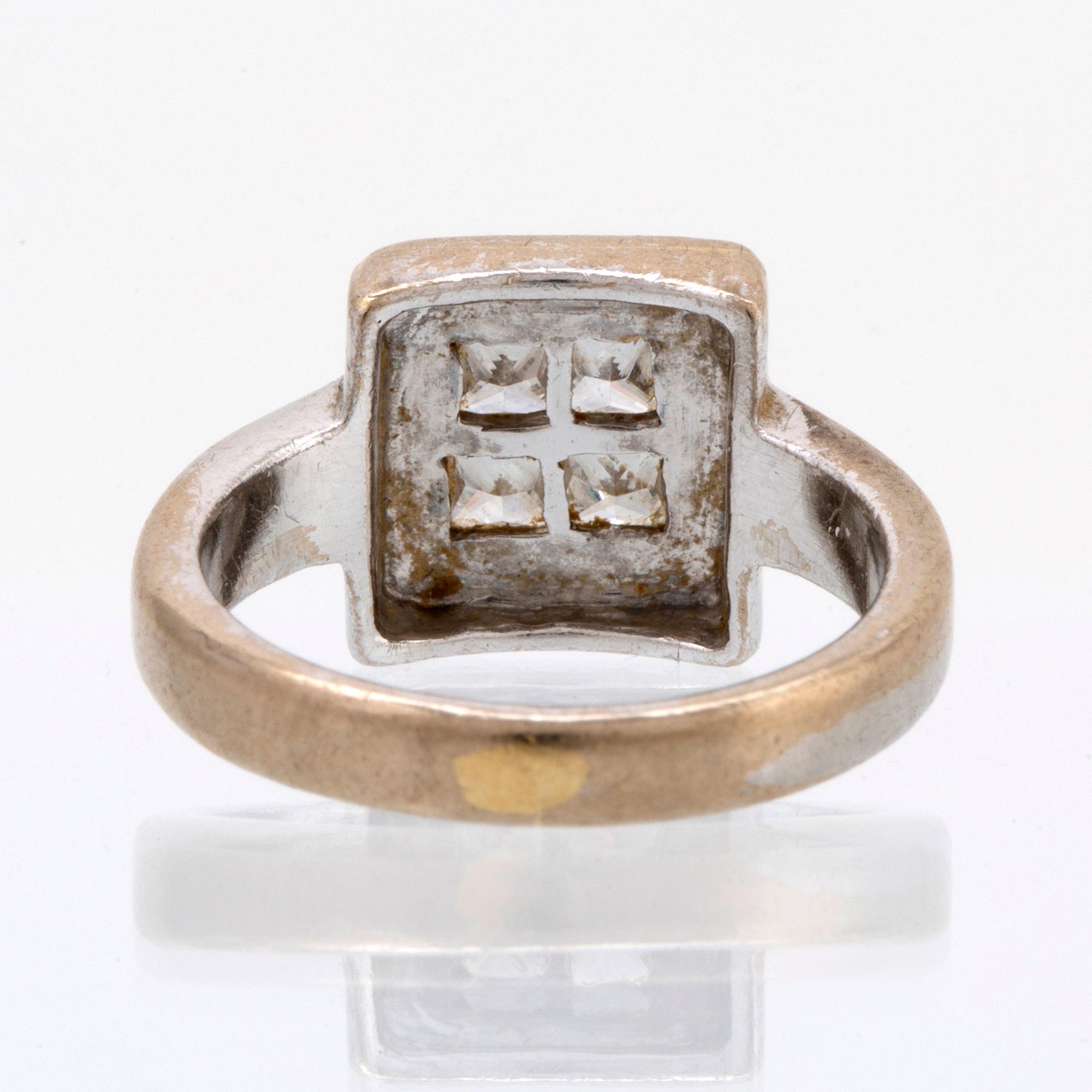 Ring 18K whitegold with 4 princess-cut diamonds approx 0,50 ct in total, size 49.