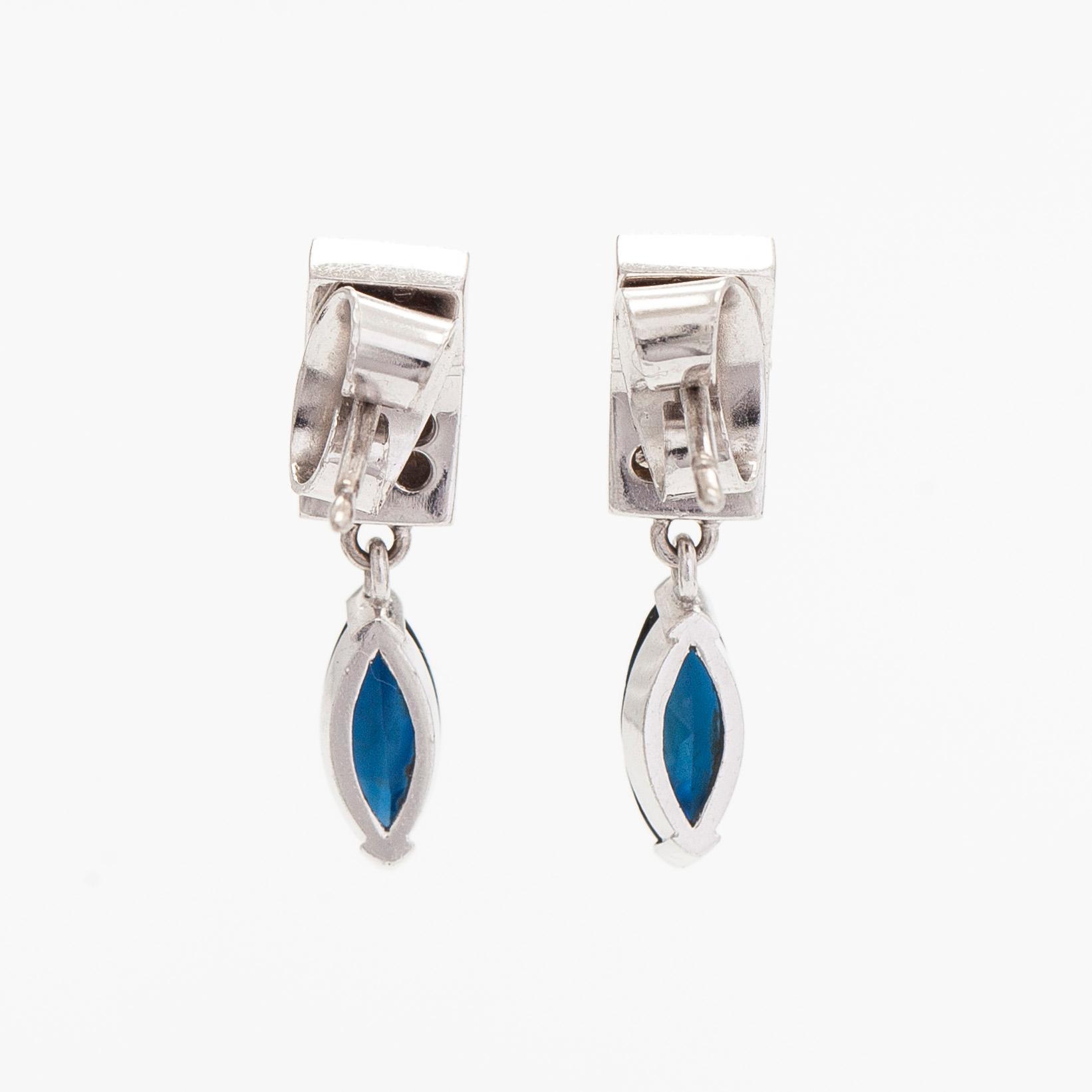 Earrings, 18K white gold with sapphires and small diamonds.
