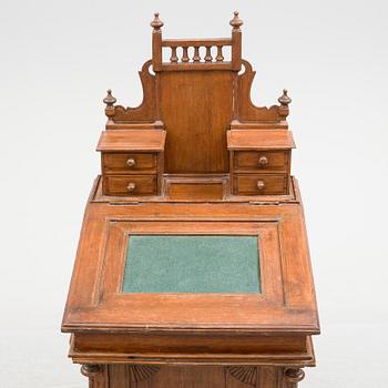 A DAVENPORT WRITING DESK, later part of the 20th century.