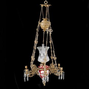 A ceiling paraffin lamp, late 19th century, hight ca 120 cm.