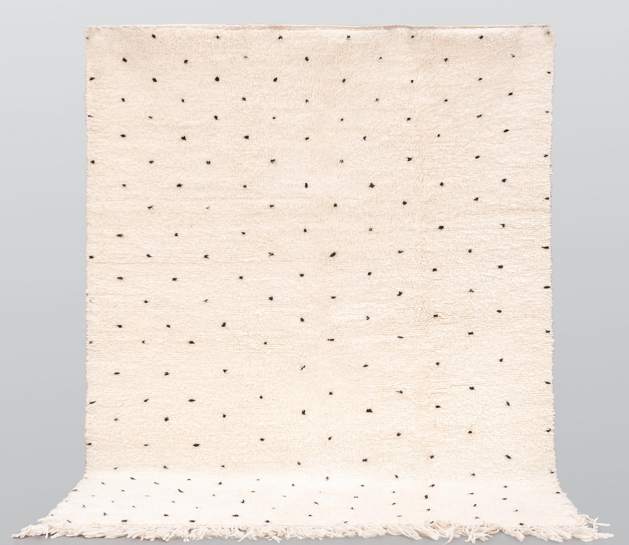 A Moroccan carpet, 254 x 160 cm.