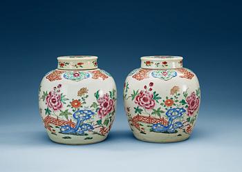 1455. A pair of famille rose jars with covers, Qing dynasty, Qianlong (1736-95).