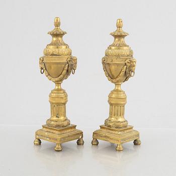 A pair of Louis XVI-style candlesticks, late 19th century.