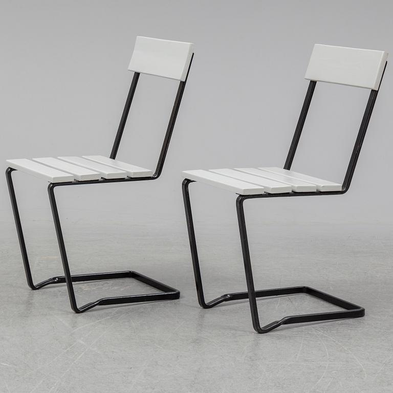 A pair of Grythyttan garden chairs.