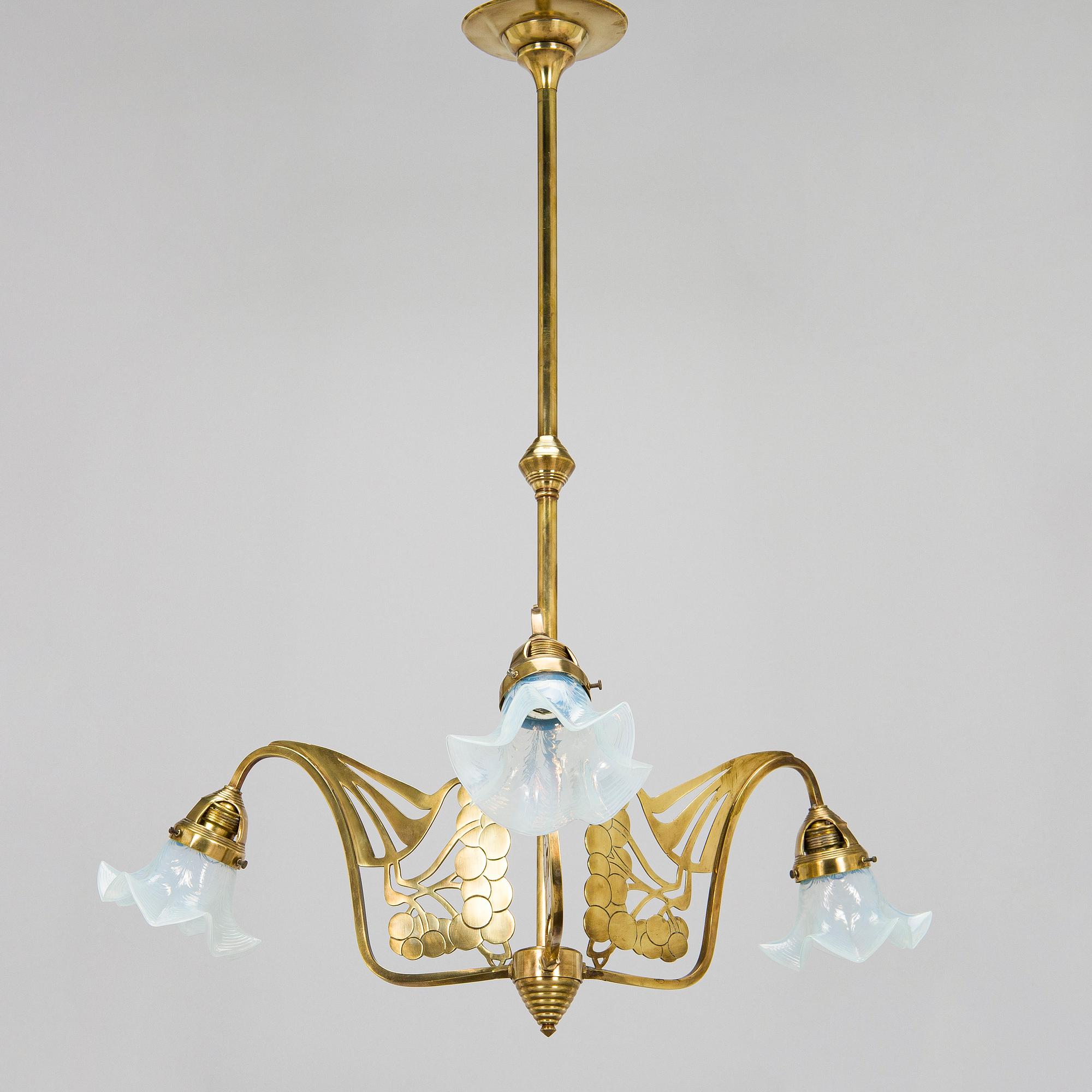 Kattovalaisin, 1900-luvun alku.