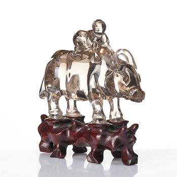 A rock chrystal sculpture of a boy on a buffalo, Qing dynasty, 19th century.