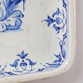 A rococo faience-top tea table, Rörstrand 1760.