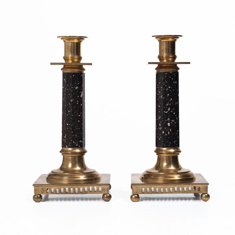 A pair of candlesticks brass and porphyry, EOS Jönköping, 20th century.