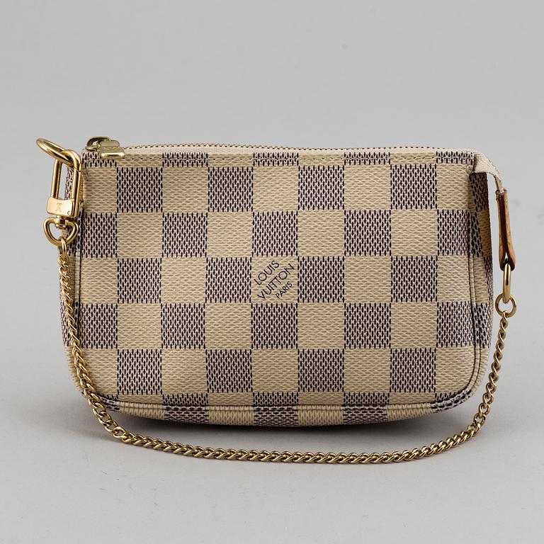 LOUIS VUITTON, A 'Mini Pochette Accessoires' and a shoulder strap.