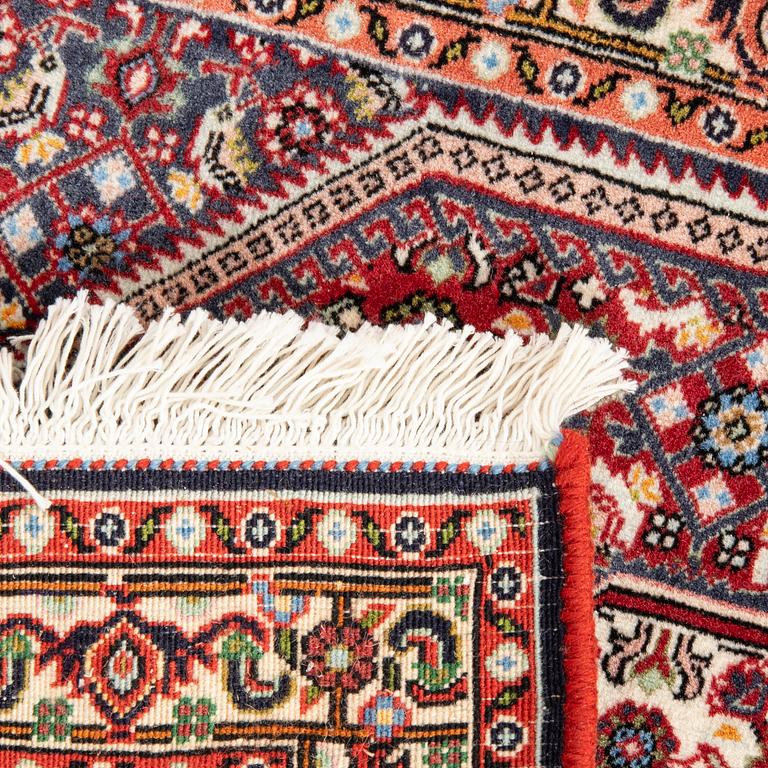 An old Bidjar carpet approx 100x71 cm.