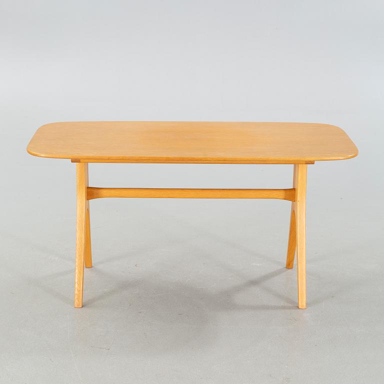 A "Stora salen" sofa table, designed by Carl Malmsten, by Åfors Möbelfabrik in the second half of the 20th century.