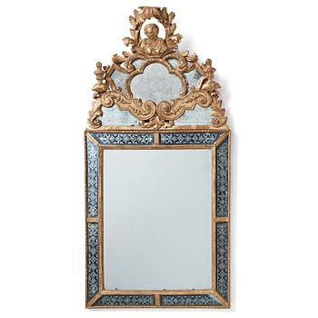 A Baroque mirror, circa 1700.