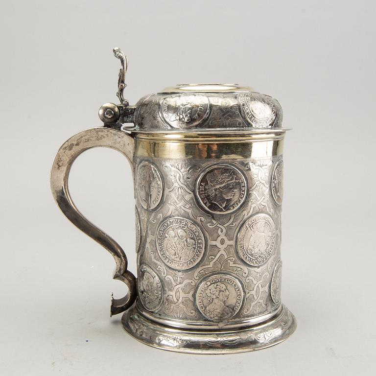 A German 18th century parcel-gilt silver coin-tankard, mark of Johann Friedrich Beyer, Schweidnitz (1736-1775).