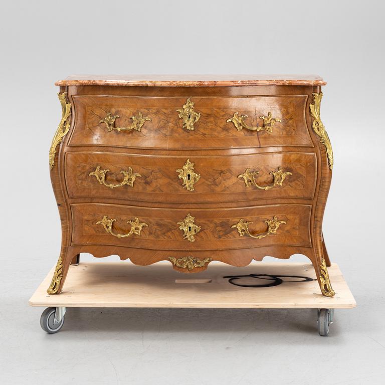 A Rococo style chest of drawers, around 1900.