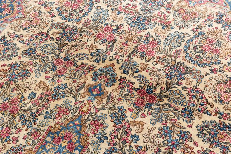 A carpet, Kerman, ca 323 x 213 cm.