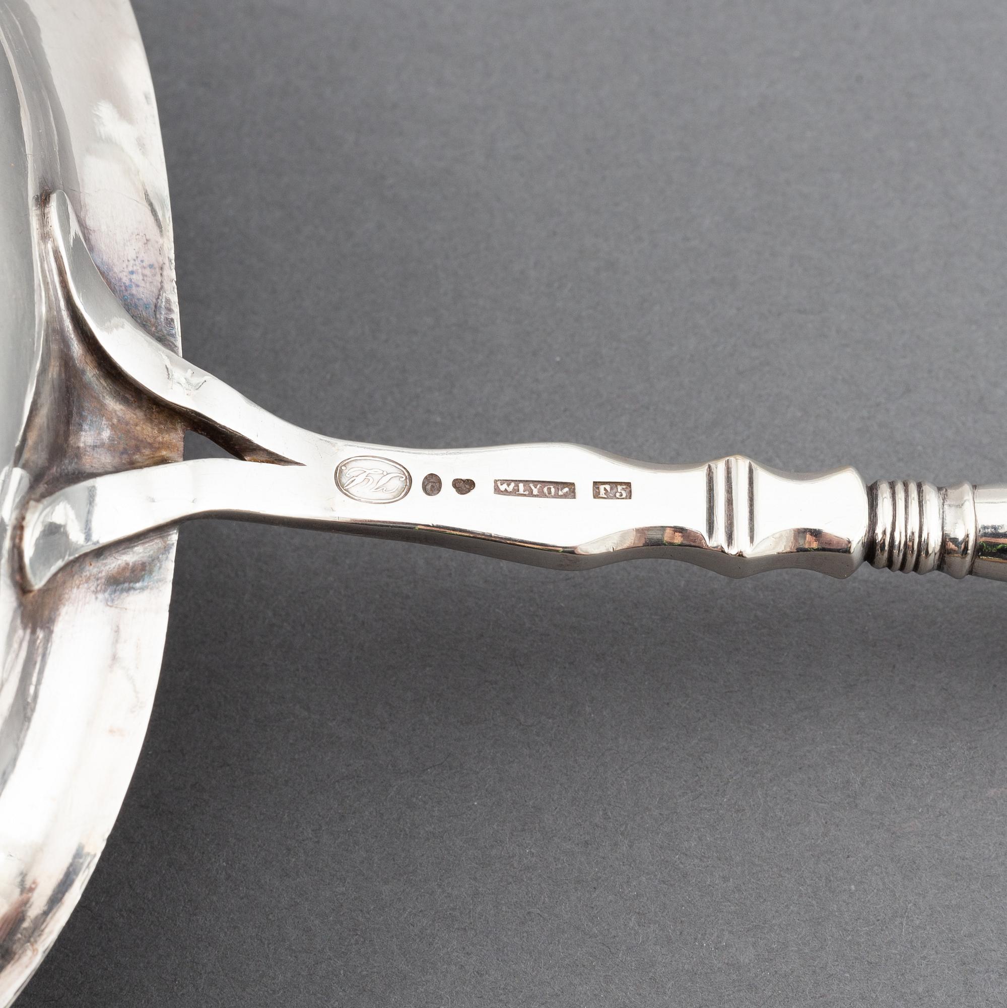 Two 19th century Swedish silver soup-ladles and a silver brandy-ladle.