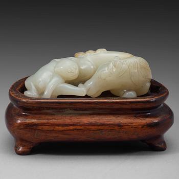 344. A chinese nephrite figure of a reclining horse and a monkey, early 20th Century.