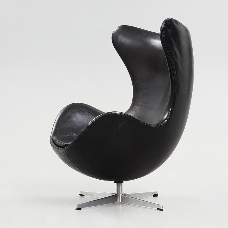 An Arne Jacobsen black leather 'Egg' chair, Fritz Hansen, Denmark 1960's.