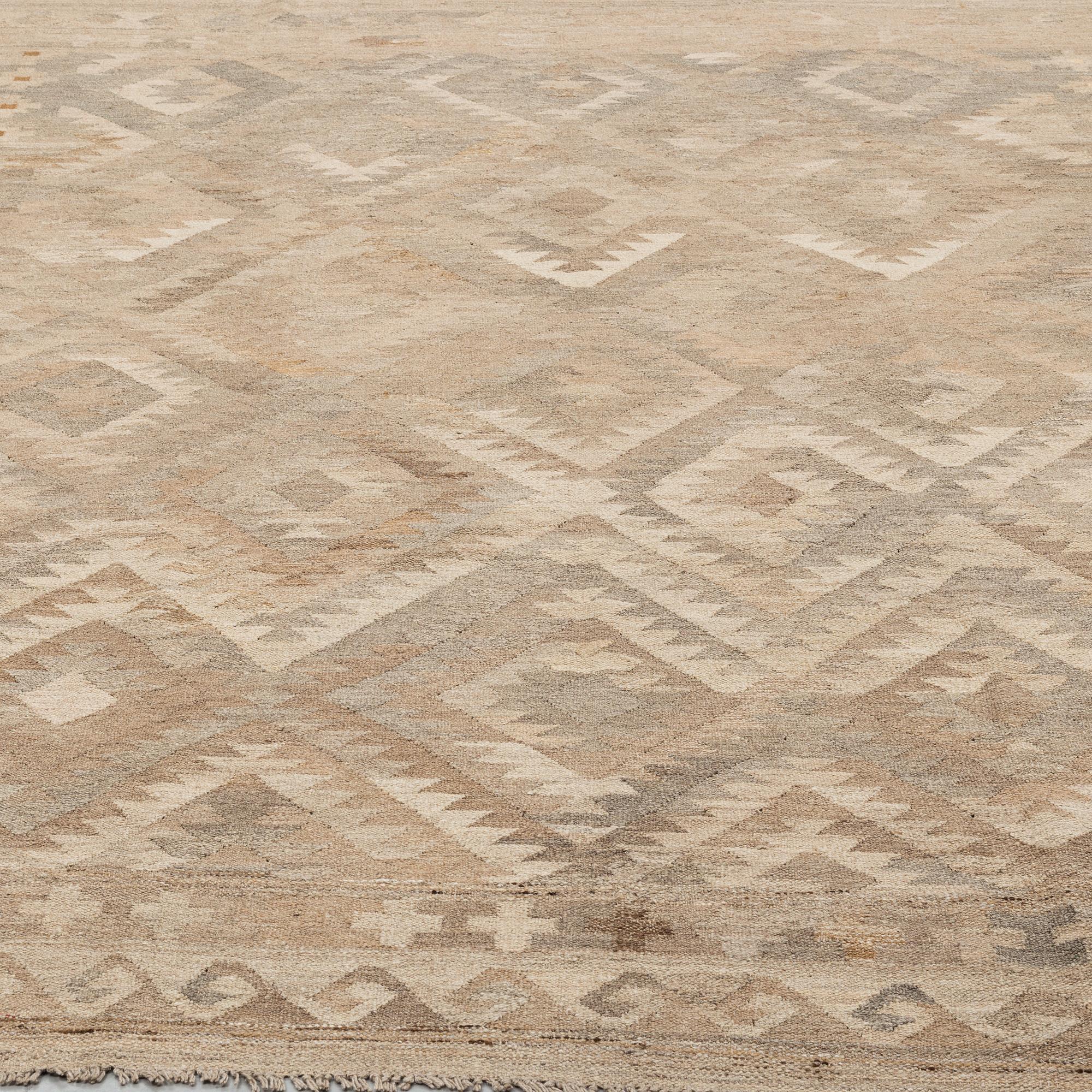 A CARPET, Kilim, 306 x 208 cm.