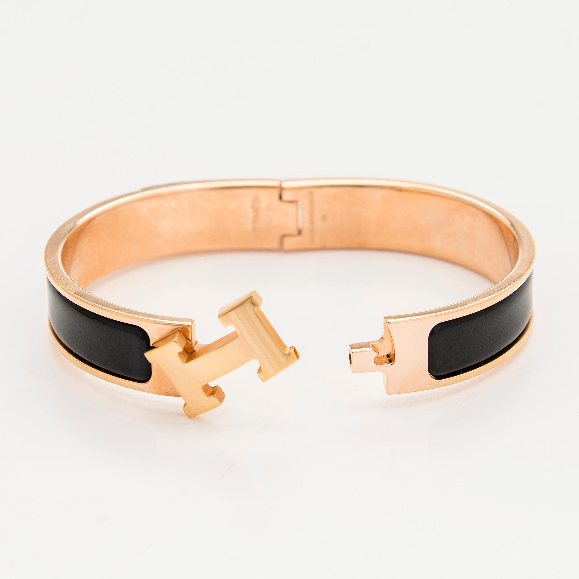 Hermès, a 'Clic H' bracelet.