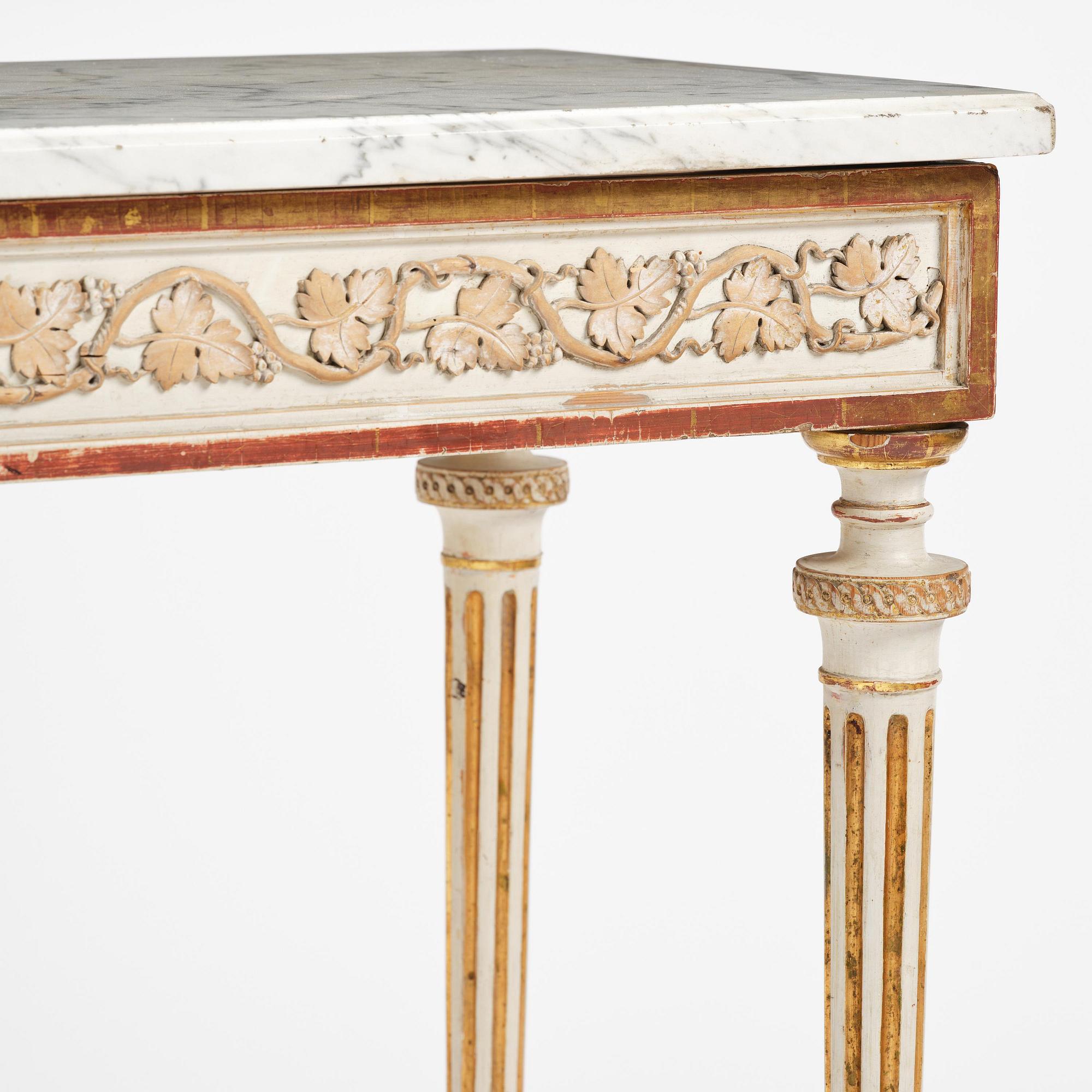 A late Gustavian carved giltwood and marble console table, attributed to P- Ljung (royal ornament carver 1788-1819).