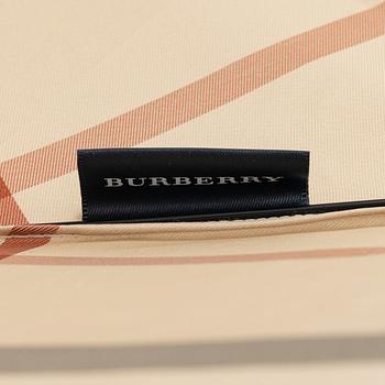 Burberry, an umbrella.