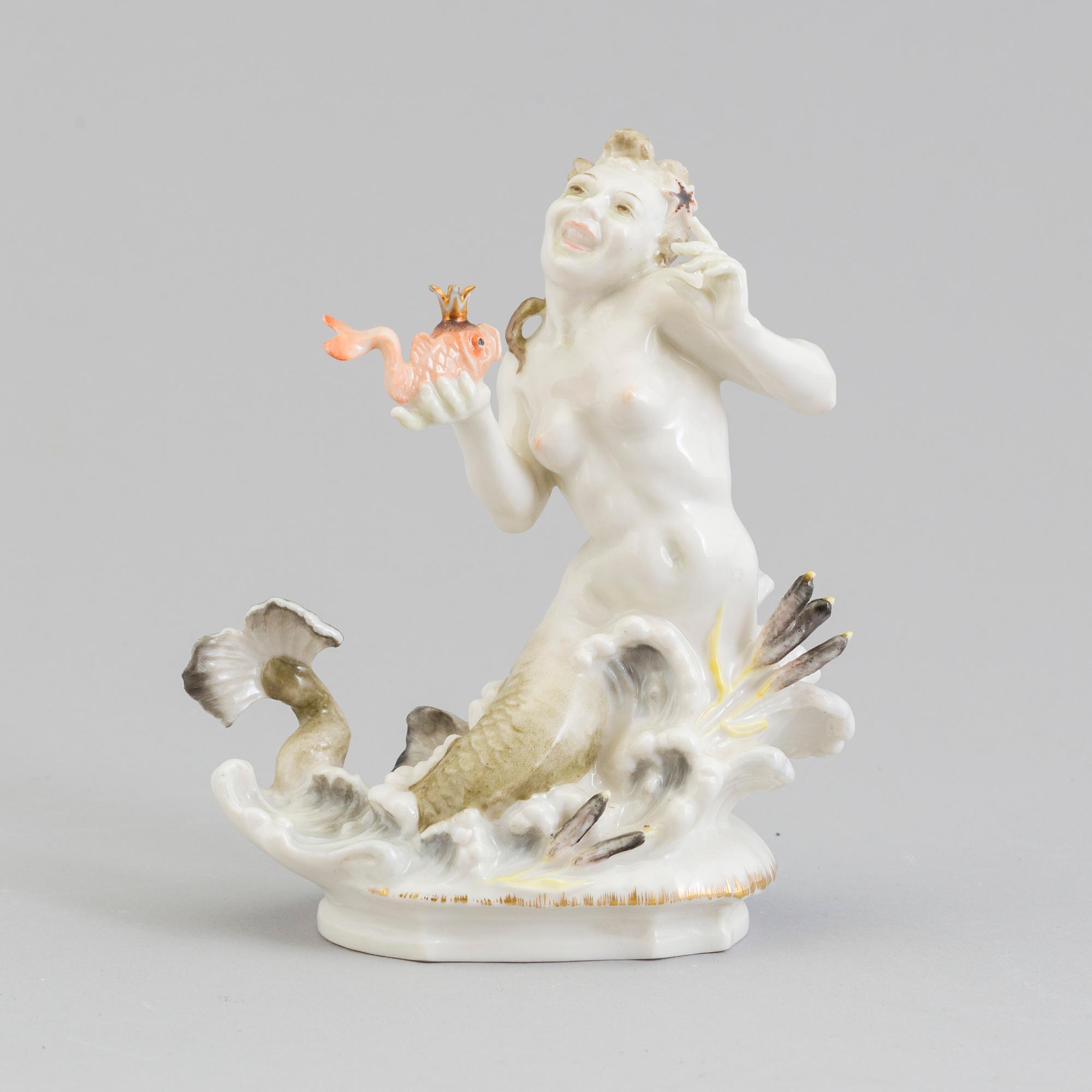 A Hutschenreuter figure of a mermaid with a fish prince, Germany, 1955-68.