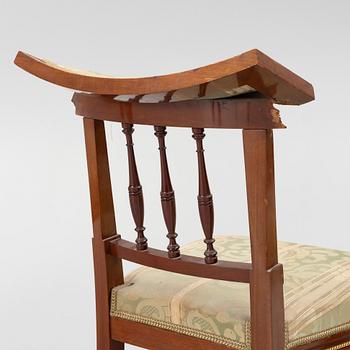 A sofa, two armchairs, four chairs and table, Empire style, 20th century.