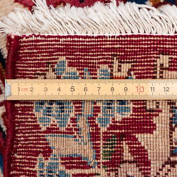 A Yazd carpet, approx. 418 × 297 cm.