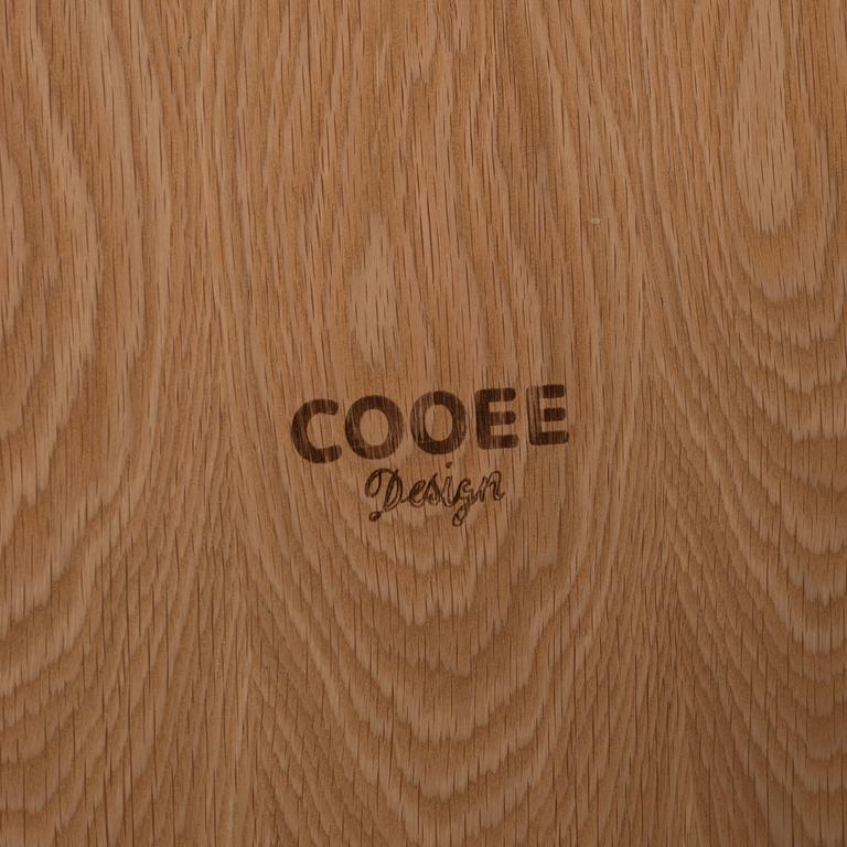 A 'Woody' oak veneered coffee table from Cooee design.