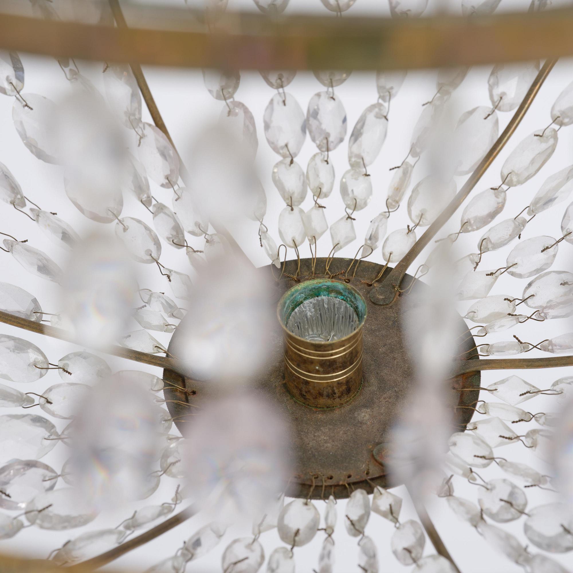 A late Gustavian gilt brass and cut glass seven-light chandelier, Stockholm late 18th century.