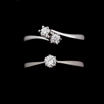 RINGAR, 2st, enstens- och syskonring, 18k vitguld, tot ca0,25ct. Tot.vikt 4g.