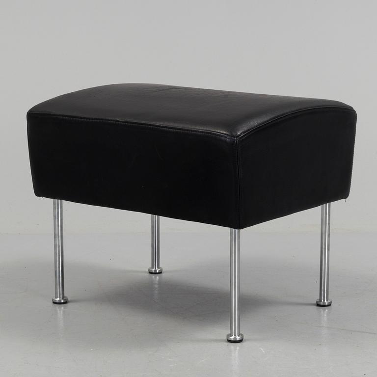 A "Cinema" footstool by Gunilla Allard.