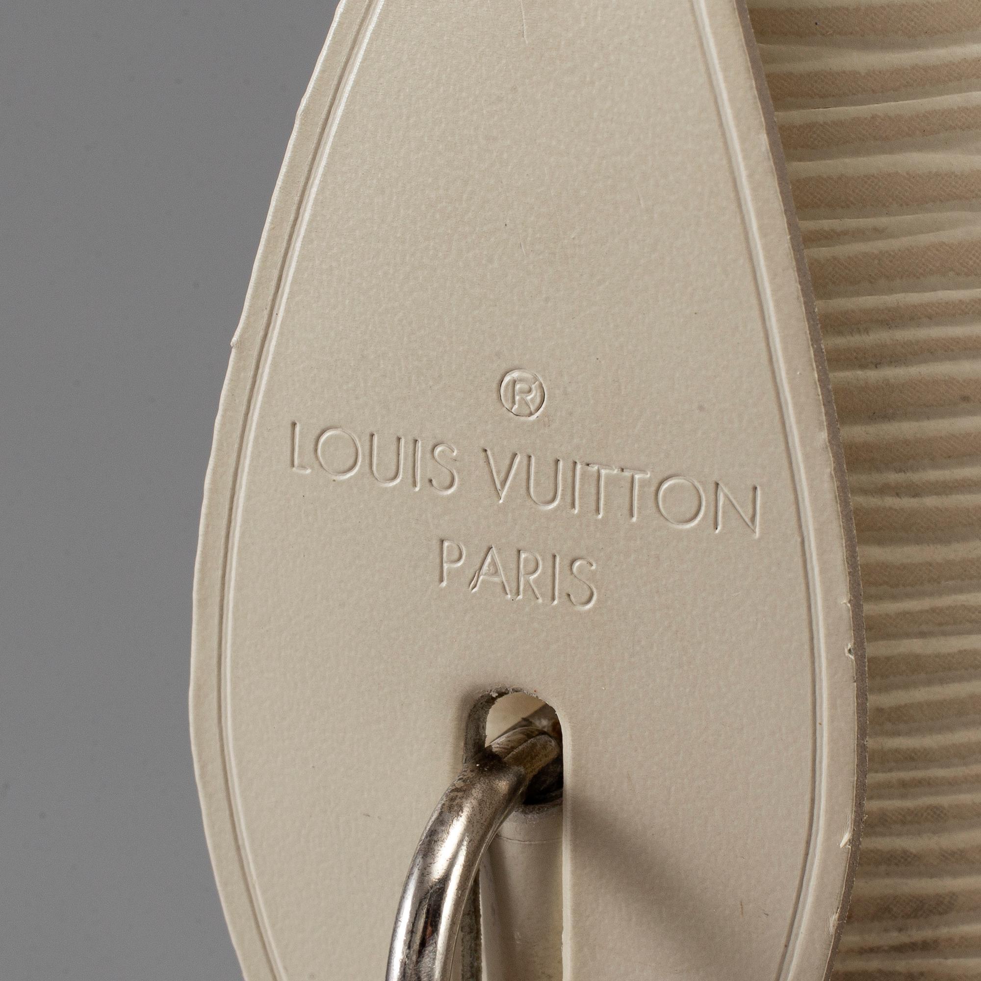 LOUIS VUITTON, 'Epi Lockit Vertical'.