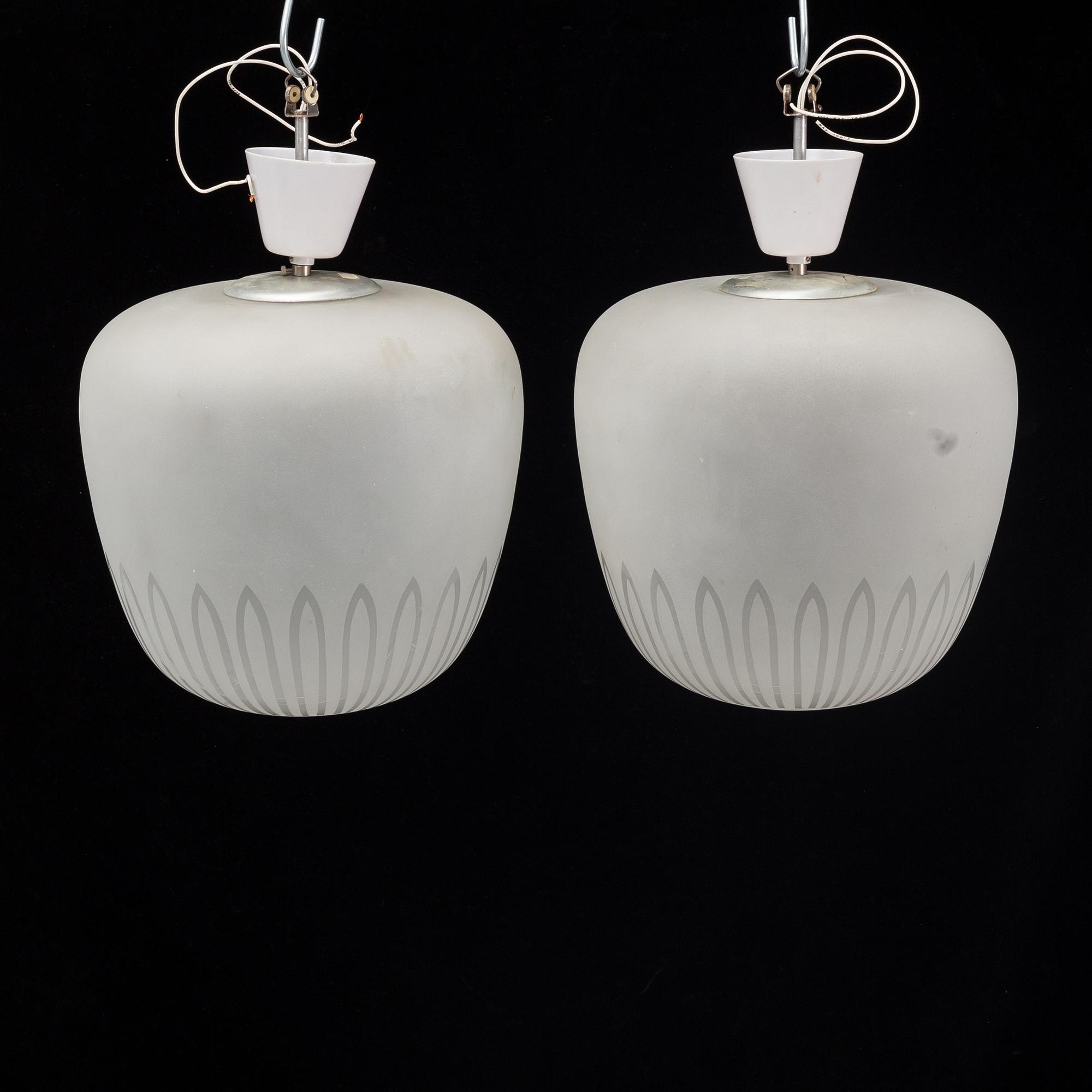 A pair of 1940's Swedish medern ceiling lamps.