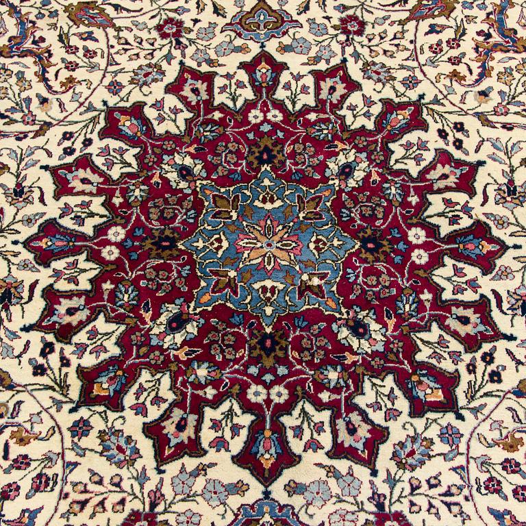 A Meshed rug, old, 380 x 300 cm.