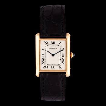 1423. A Cartier 'tank' golc watch, 2000-2005.
