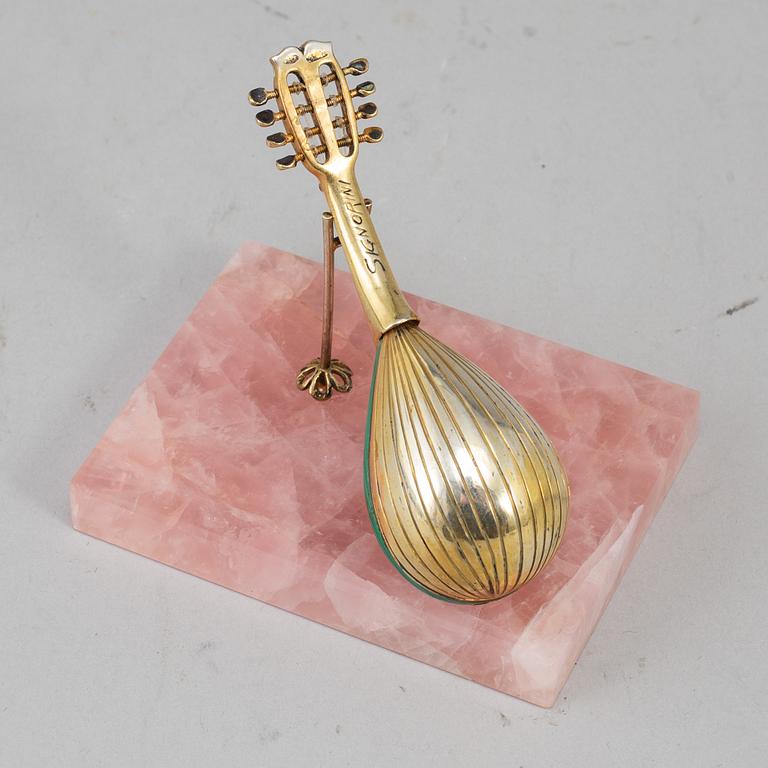 An Italian silver gilt and malachite miniature guitar, first half of the 20th century.