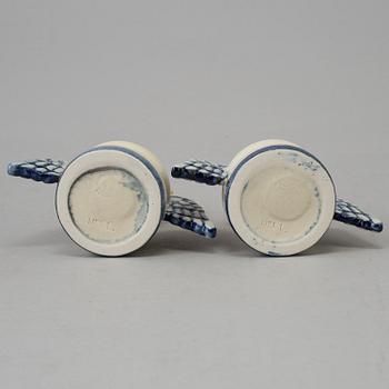 A pair of stoneware angel candel sticks from Gustavsberg.