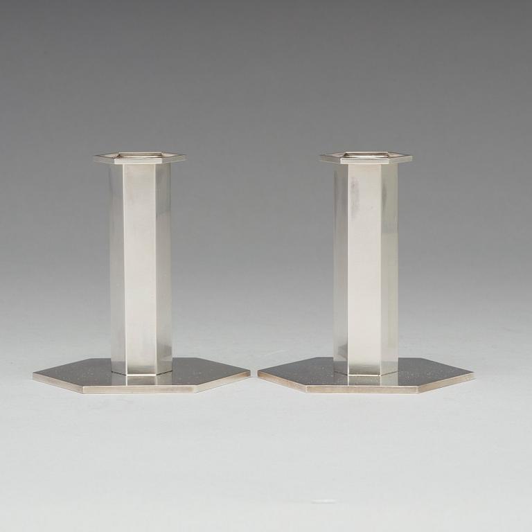 Wiwen Nilsson, a pair of sterling candlesticks, Lund 1964 and 1968.