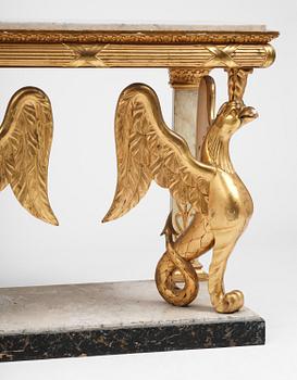 A Swedish Empire gilt wood and white marbel console table.